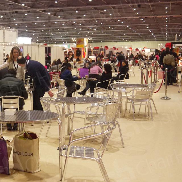 https://d1hcs5uofxldvl.cloudfront.net/chair-hire/article_additional/pro-beauty-16/pro-beauty-16.jpg - Break out areas with chrome bistro tables and chairs.