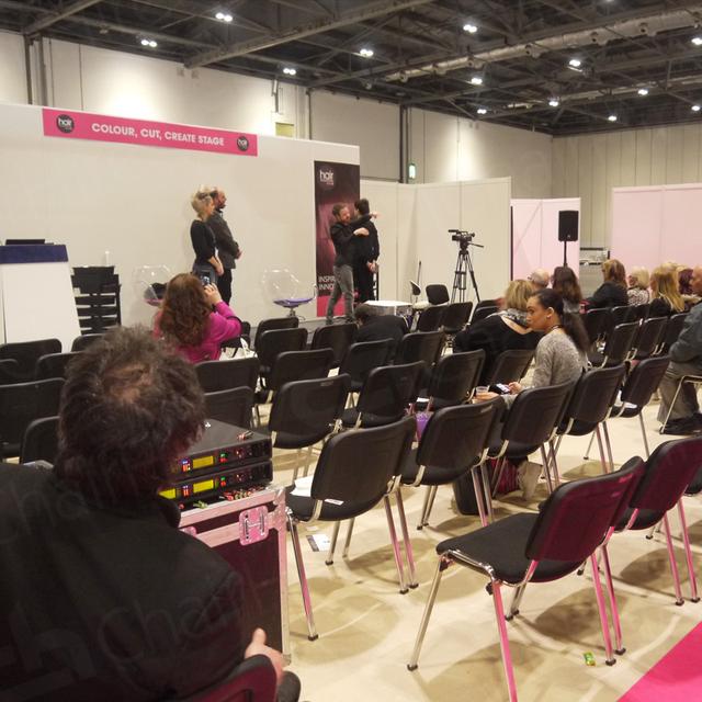 https://d1hcs5uofxldvl.cloudfront.net/chair-hire/article_additional/pro-beauty-3/pro-beauty-3.jpg - Black Stacking Chairs for lectures and seminars.