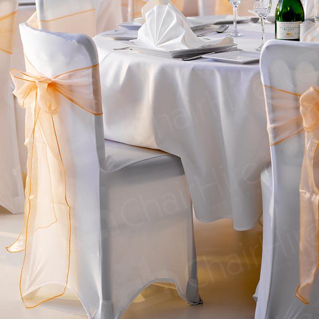 Wedding Furniture Hire https://d1hcs5uofxldvl.cloudfront.net/chair-hire/article_additional/banquet-chair-hire/banquet-chair-hire.jpg - White wedding & our white linen & bows for a magical look.
