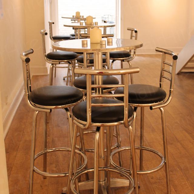 Chartered Surveyor Networking Event https://d1hcs5uofxldvl.cloudfront.net/chair-hire/article_additional/chartered-surveyor-event-8/chartered-surveyor-event-8.jpg - Sophistication and elegance with candle decorations.