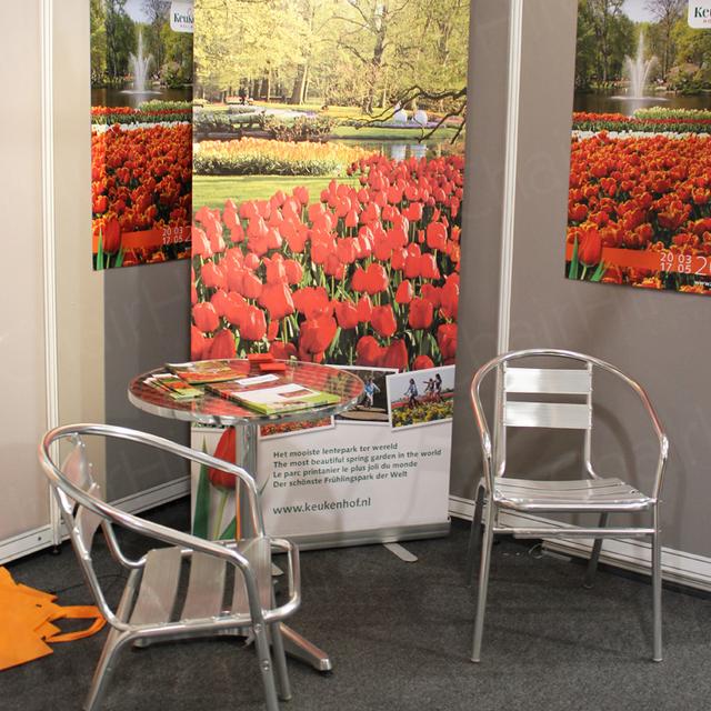 Exhibitions https://d1hcs5uofxldvl.cloudfront.net/chair-hire/article_additional/garden-and-press-event5/garden-and-press-event5.jpg - Chrome bistro tables and chairs for that outdoor feeling.