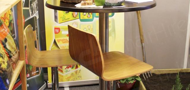 Exhibitions https://d1hcs5uofxldvl.cloudfront.net/chair-hire/article_additional/garden-and-press-event9/garden-and-press-event9-740x350.jpg - Ultra contemporary look with walnut poseur tables and stools.