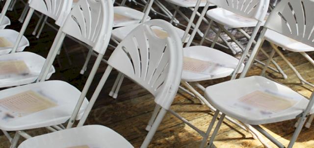 Presentation In The City https://d1hcs5uofxldvl.cloudfront.net/chair-hire/article_additional/presentation-in-the-city7/presentation-in-the-city7-740x350.jpg - White fan backs set up for city event.