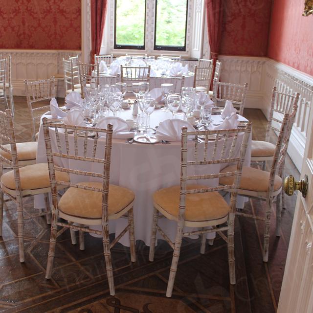 Furniture Hire for Weddings https://d1hcs5uofxldvl.cloudfront.net/chair-hire/article_additional/weddings-at-universities10/weddings-at-universities10.jpg - Chiavaris & linen reflecting the dreamy light.