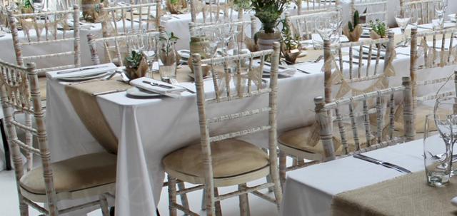 Your Wedding https://d1hcs5uofxldvl.cloudfront.net/chair-hire/article_additional/your-wedding-with-chair-hire8/your-wedding-with-chair-hire8-740x350.jpg - Hessian table runners bring out the Chiavaris' limewash finish.