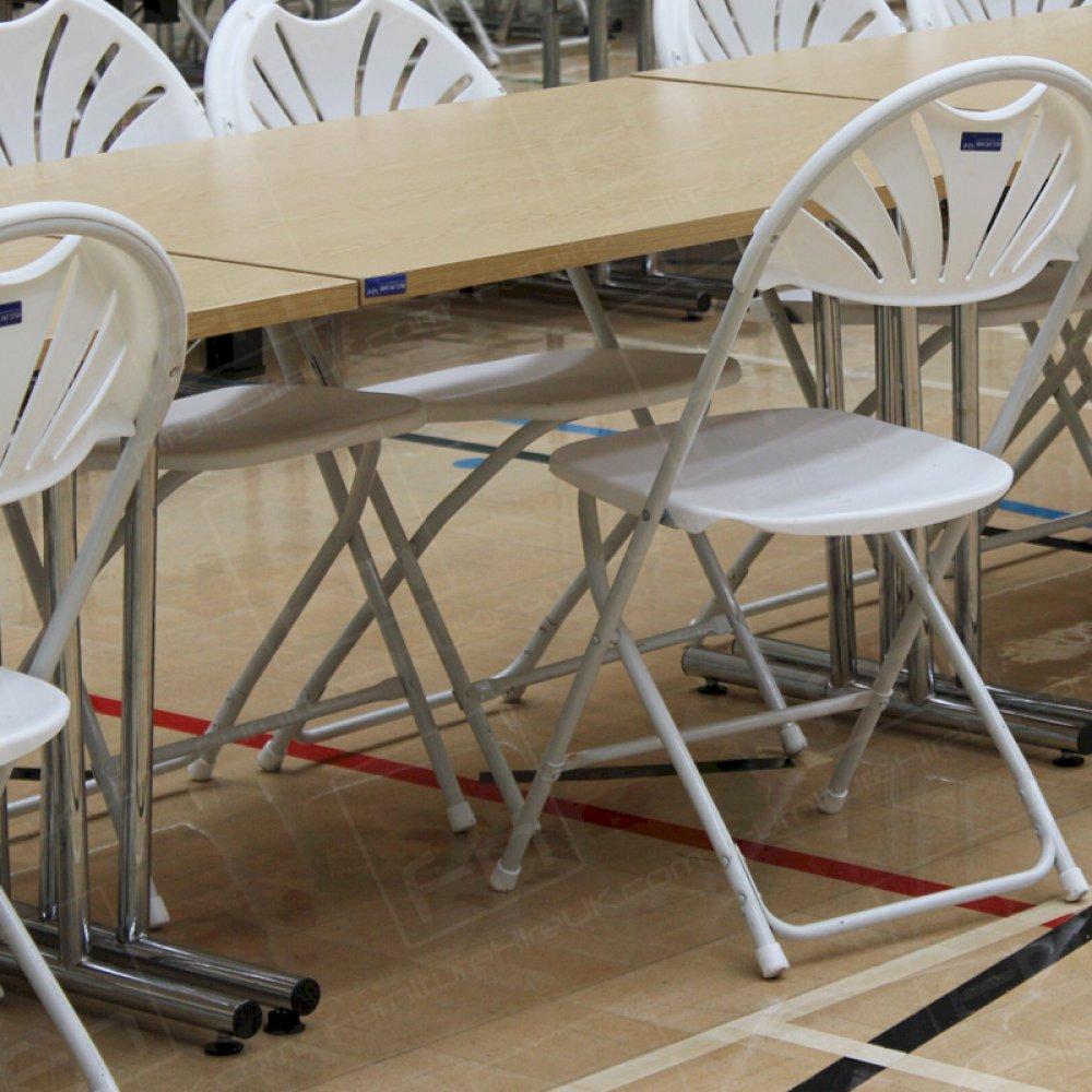 White folding chairs are lightweight and extremely versatile