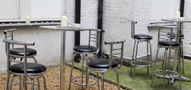 Chartered Surveyor Networking Event https://mill-media.s3.eu-west-2.amazonaws.com/chair-hire/article_additional/chartered-surveyor-event-5/chartered-surveyor-event-5-740x350.jpg - Chrome Poseur Tables HT04 & Black Leather Stools with High Back HC10 pictured.