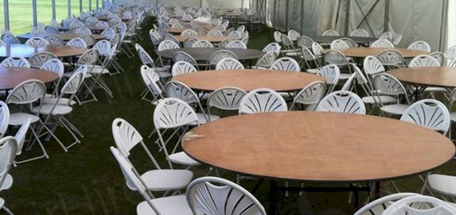 Sporting Event https://mill-media.s3.eu-west-2.amazonaws.com/chair-hire/article_additional/lashings-11-event2/lashings-11-event2-740x350.jpg - Folding chairs & trestle tables ready for decorating.