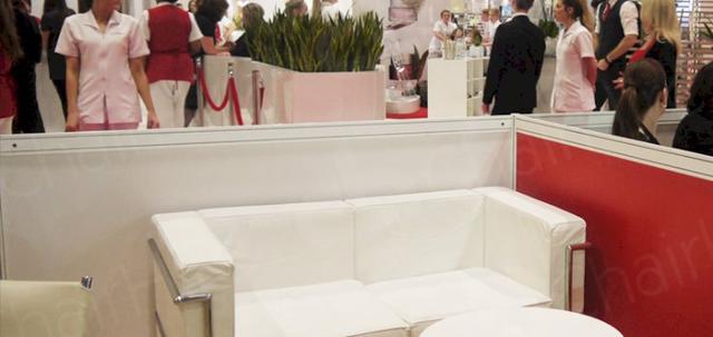 Pro Beauty https://mill-media.s3.eu-west-2.amazonaws.com/chair-hire/article_additional/pro-beauty-21/pro-beauty-21-740x350.jpg - VIP areas with white furniture.