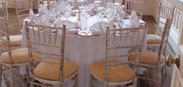 Furniture Hire for Weddings https://mill-media.s3.eu-west-2.amazonaws.com/chair-hire/article_additional/weddings-at-universities10/weddings-at-universities10-740x350.jpg - Chiavaris & linen reflecting the dreamy light.
