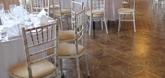 Furniture Hire for Weddings https://mill-media.s3.eu-west-2.amazonaws.com/chair-hire/article_additional/weddings-at-universities3/weddings-at-universities3-740x350.jpg - Deluxe looks with white linen & our Chiavari chairs.