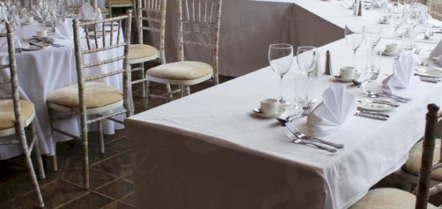 Furniture Hire for Weddings https://mill-media.s3.eu-west-2.amazonaws.com/chair-hire/article_additional/weddings-at-universities5/weddings-at-universities5-740x350.jpg - Chiavari chairs bring elegance to the top table.