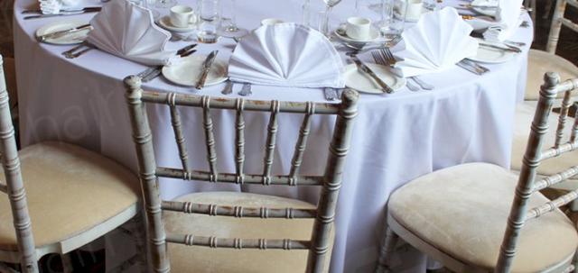 Furniture Hire for Weddings https://mill-media.s3.eu-west-2.amazonaws.com/chair-hire/article_additional/weddings-at-universities7/weddings-at-universities7-740x350.jpg - Limewash Chiavaris team perfectly with our white linen.