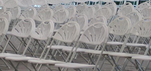 White Folding Chair https://mill-media.s3.eu-west-2.amazonaws.com/chair-hire/article_additional/white-folding-chair6/white-folding-chair6-740x350.jpg - Multi-seating for careers' event.
