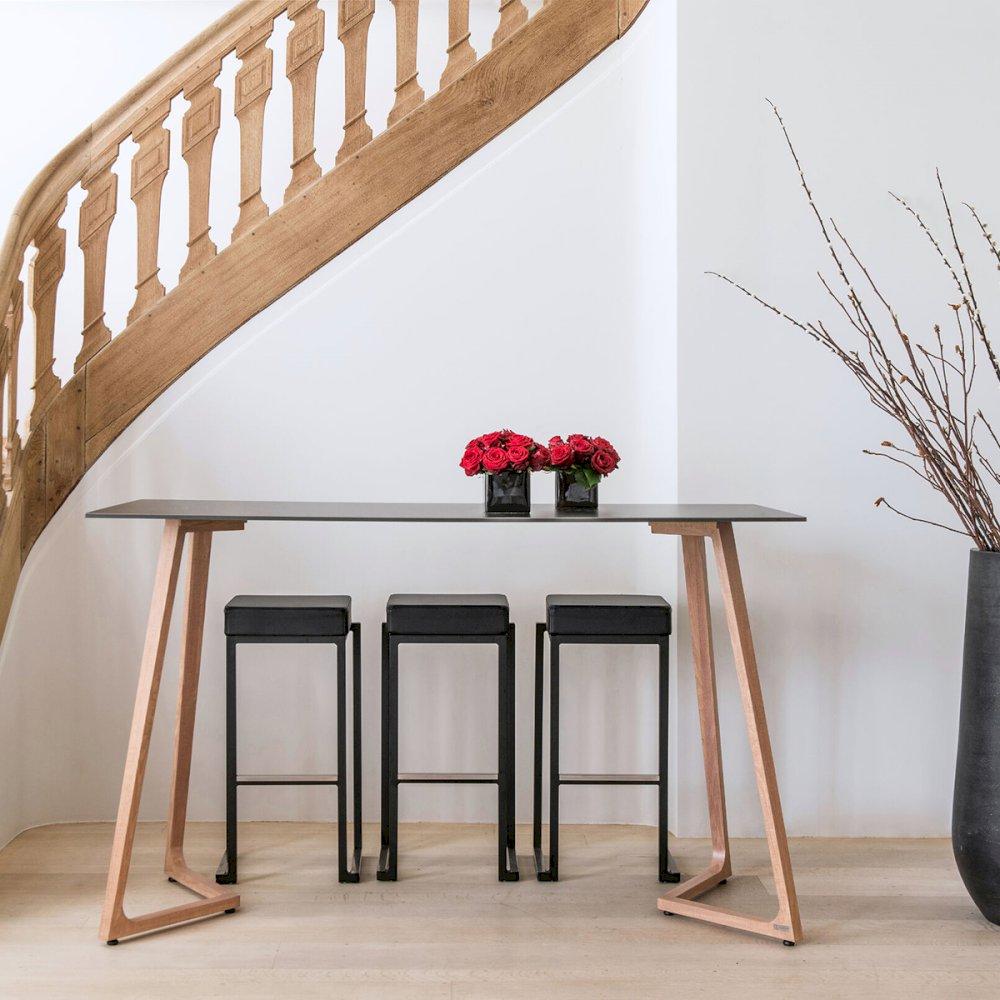 Featured: Black Boston cocktail table paired with black Nevada stools.