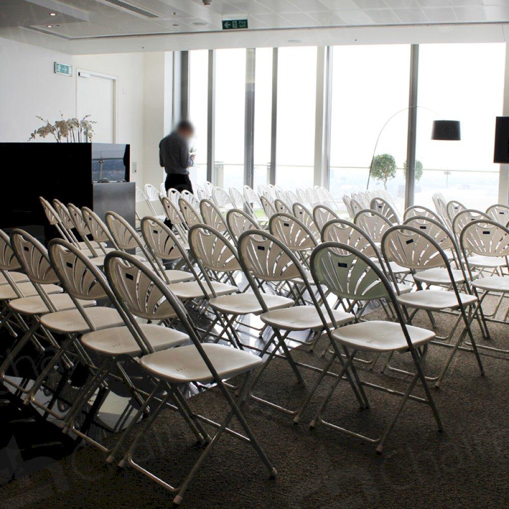 Folding fan back chairs are a popular choice at meetings and conferences. (HC76)
