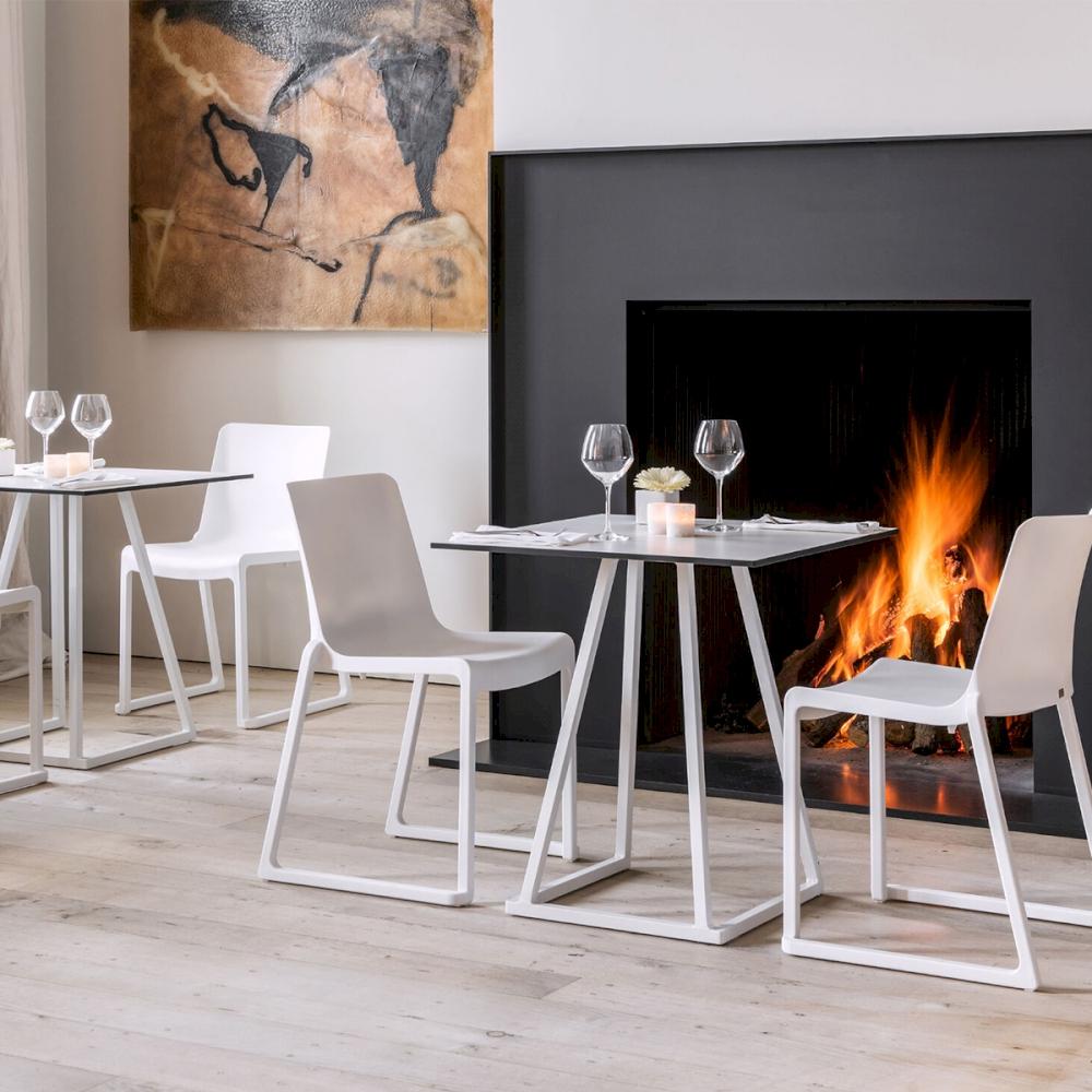 Featured: White, square Dallas bistro tables paired with white Kansas chairs.