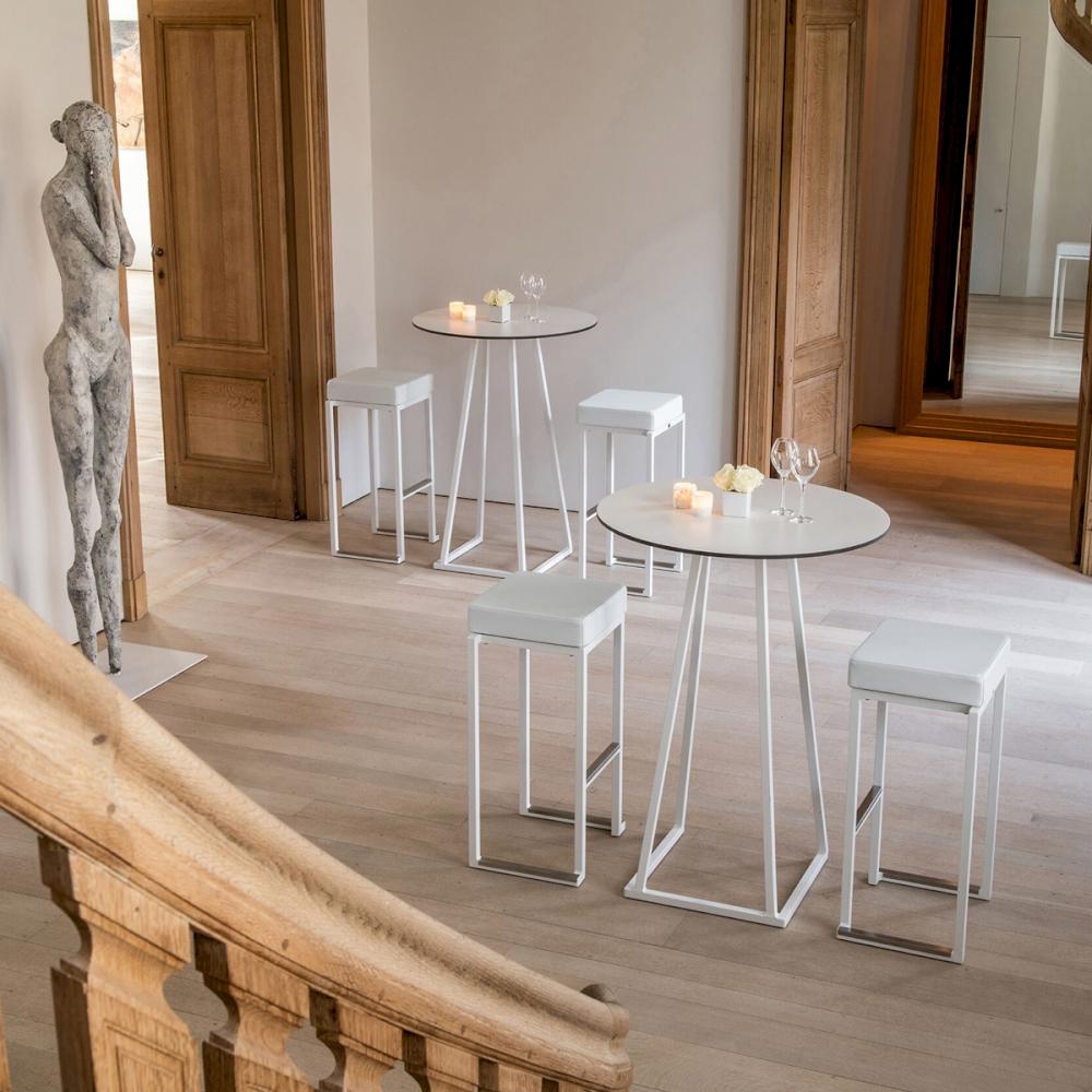 Featured: White, round Dallas poseur tables with white Nevada stools.
