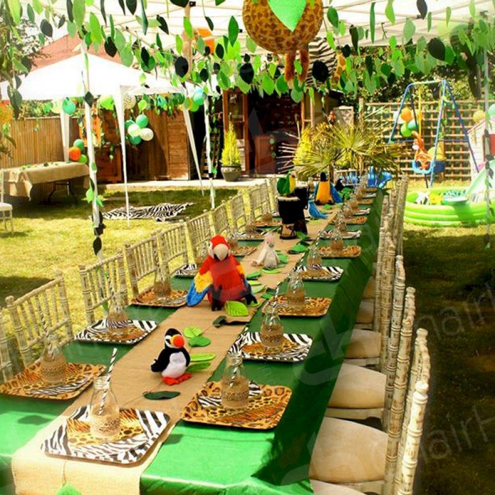 1830 trestle tables and limewash chiavari chairs used to create your own safari event.