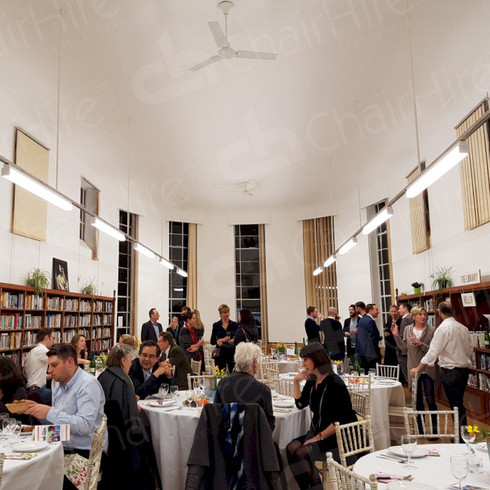 fully dressed banqueting tables with elegant limewash chiavari chairs