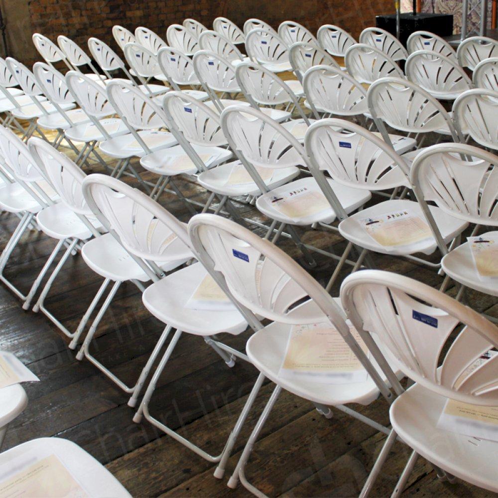 Folding chairs provide lots of seating in smaller spaces.