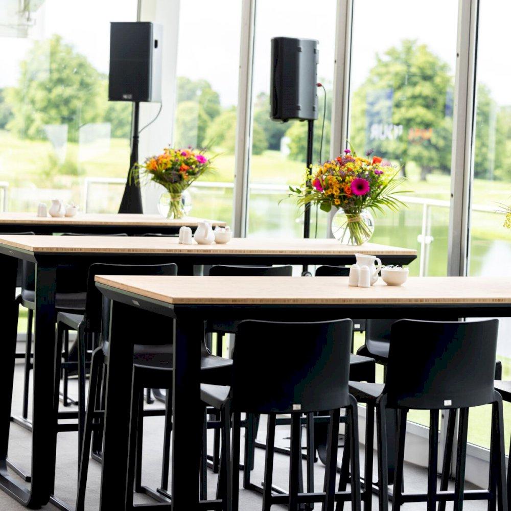 Featured: Black frame poseur table paired with black Kansas stools.