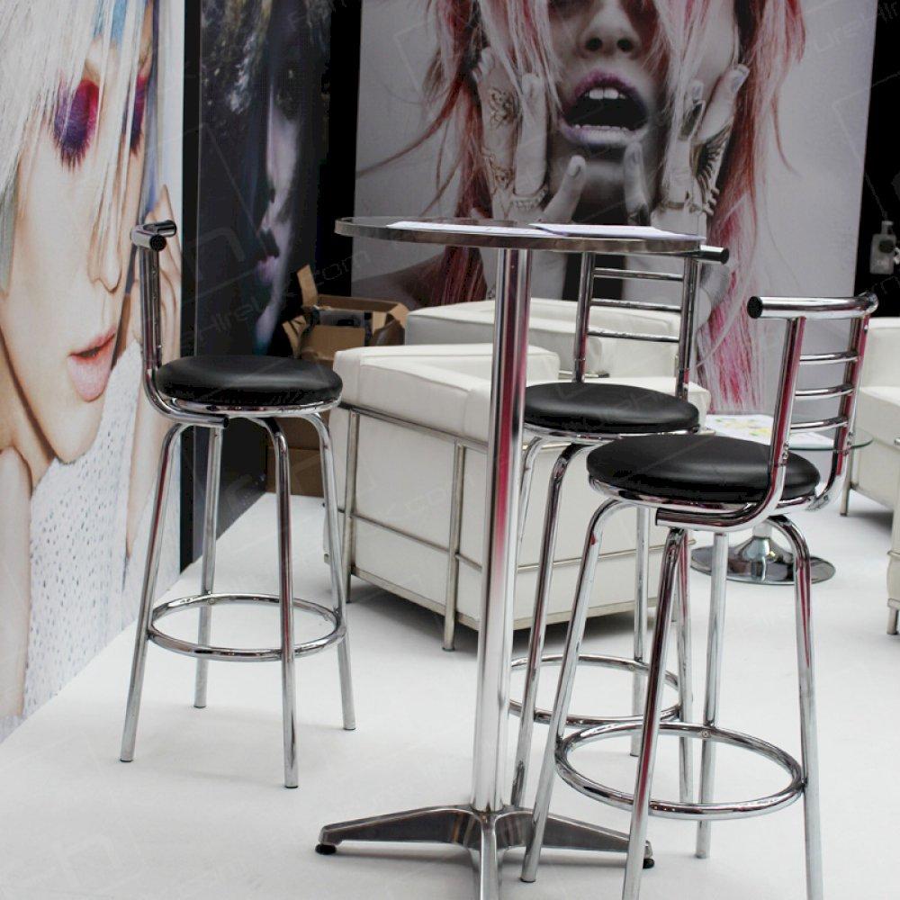 Chrome tables & stools team well with white sofas.